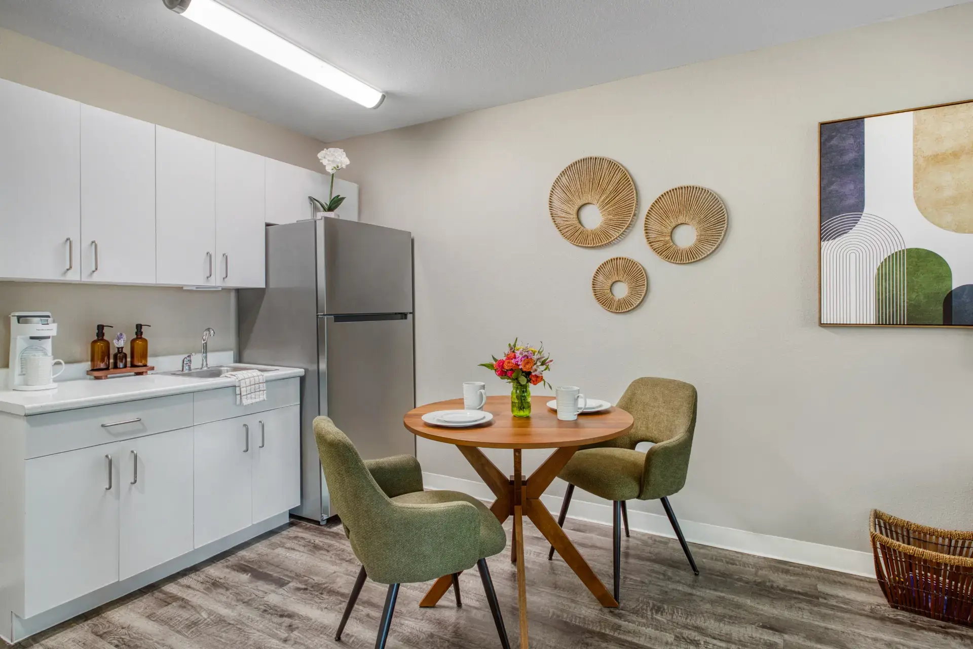 Kitchen with dining table fully furnished.