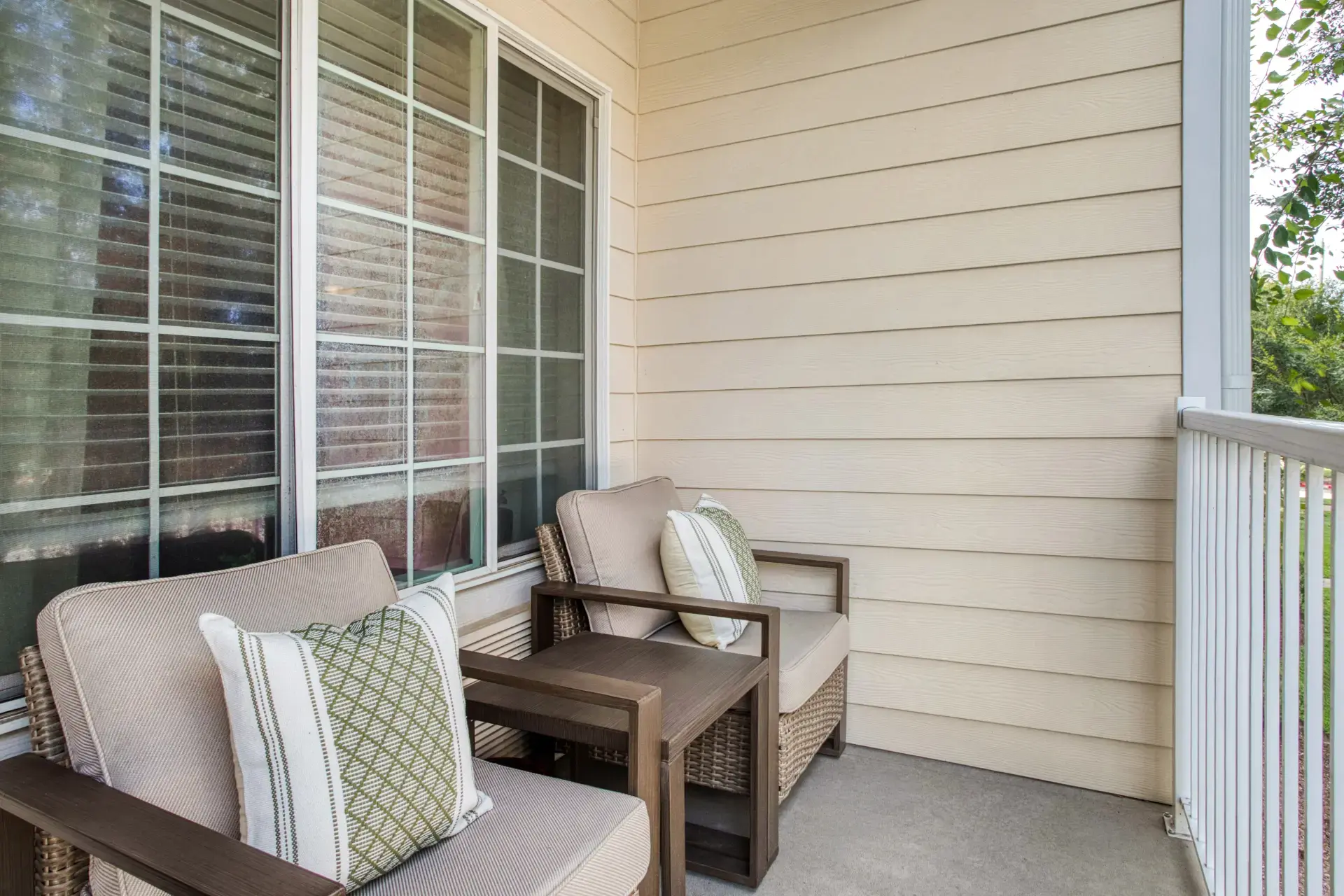 Porch seating with pillows.