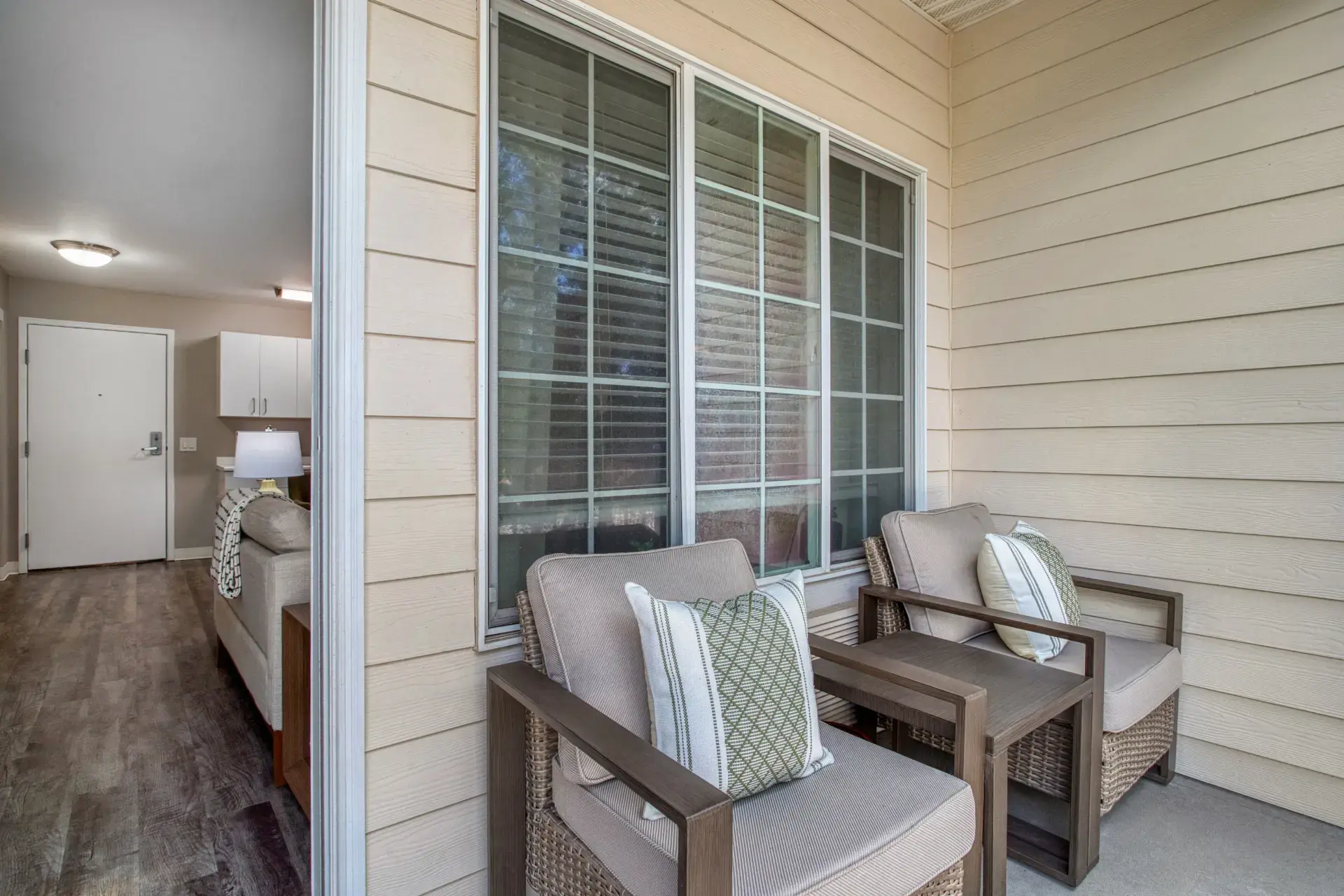 Frong door seating with inside view of living room.